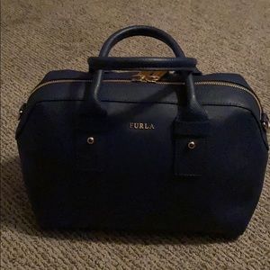 Gently used Navy Furla Small Stachel.